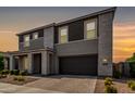 Charming two-story home boasts a modern design, two-car garage, and well-maintained landscaping at 4746 S Orbit St, Mesa, AZ 85212