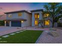 Contemporary two-story home featuring an attached garage and desert landscaping at 175 N Brookside St, Chandler, AZ 85225