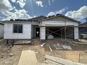 Image of the exterior of a home in progress with scaffolding and a blue sky at 2385 E Spur Dr, San Tan Valley, AZ 85140