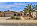 Attractive single-story home boasts a well-maintained front yard, desert landscaping, and a convenient attached garage at 4249 E Nightingale Ln, Gilbert, AZ 85298