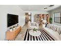 Bright living room with modern decor and furniture, with plenty of natural light at 540 W Palo Verde St, Casa Grande, AZ 85122