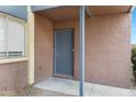 Exterior shot of unit door showing door number and door hardware at 16602 N 25Th St # 112, Phoenix, AZ 85032