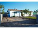 The exterior shows a well-maintained home, featuring a drive way and a newly landscaped yard at 2019 W Wayland Rd, Phoenix, AZ 85041