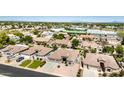 A suburban neighborhood featuring single-Gathering homes with well-maintained yards and two-car garages at 2476 E Marlene Dr, Gilbert, AZ 85296