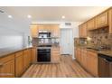 Spacious kitchen with granite countertops and stainless steel appliances at 2436 E Elm St, Phoenix, AZ 85016