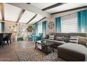 Bright and airy living room with modern furnishings and an open layout at 3104 E Broadway Rd # 170, Mesa, AZ 85204