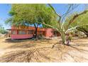 Charming one story home featuring large mature trees, offering a serene setting at 330 W Minnezona Ave, Phoenix, AZ 85013