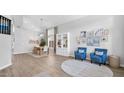Bright living area features hardwood floors, neutral walls, and cozy furnishings at 740 N Bradley Dr, Chandler, AZ 85226