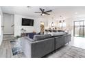 Bright, open floor plan living room showcasing a modern design with sleek furniture at 16336 E Palisades Blvd # 7, Fountain Hills, AZ 85268