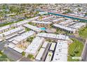 Aerial view of Winfield Place Condominiums showcasing the community layout, landscaping, and Arizona Canal Trail at 7436 E Chaparral Rd # 159B, Scottsdale, AZ 85250