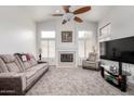 Bright living room with vaulted ceilings and fireplace at 951 N Norfolk St, Mesa, AZ 85205