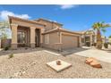 Charming two-story home featuring desert landscaping and a convenient two-car garage at 2859 E Cathy Dr, Gilbert, AZ 85296