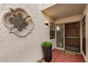 Close up of condo entrance showing unique design details and desert landscaping at 7800 E Lincoln Dr # 1035, Scottsdale, AZ 85250