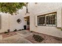 Condo exterior features decorative design and a desert-friendly landscape at 7800 E Lincoln Dr # 1035, Scottsdale, AZ 85250
