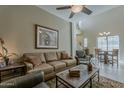 Bright and airy living room with a comfortable sofa and view to the dining area at 1367 S Country Club Dr # 1189, Mesa, AZ 85210