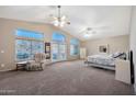 Large main bedroom with vaulted ceilings, large windows, and mountain views at 15413 S 31St Pl, Phoenix, AZ 85048