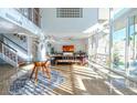 Bright and airy living space with large windows, modern decor, and stylish furnishings at 1621 E Maryland Ave, Phoenix, AZ 85016