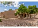 Charming single-story home featuring desert landscaping, a neutral palette, and a well-maintained front yard at 1658 N Sierra Vista Dr, Tempe, AZ 85288