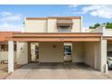 Inviting exterior of home showing the covered parking and gated entry at 2434 W Eugie Ave, Phoenix, AZ 85029