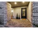 Inviting front porch with decorative brickwork, a stylish door, and charming accents at 3749 E Sagebrush St, Gilbert, AZ 85296