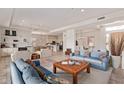 Spacious living room with tile floors, light walls, and comfortable seating with an open concept at 6214 E Evening Glow Dr, Scottsdale, AZ 85266