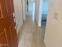 Bright entryway with neutral-toned tile flooring leading into the home at 7320 E Hackamore Ln, San Tan Valley, AZ 85143