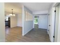 Inviting entryway with neutral paint, and lovely floors that opens to the living spaces at 7811 N 46Th Ave, Glendale, AZ 85301