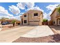 Two-story home with wide driveway and low water landscaping at 8341 W Palo Verde Ave, Peoria, AZ 85345