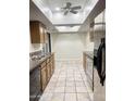 Well-equipped kitchen featuring stainless steel appliances, ample counter space, and natural light at 12222 N Paradise Village S Pkwy # 409, Phoenix, AZ 85032