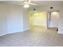 Inviting living room with tile floors and open layout, perfect for entertaining and relaxation at 12222 N Paradise Village S Pkwy # 409, Phoenix, AZ 85032