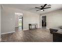 Open concept living room with tile floors and seamless flow to other spaces at 14842 N 36Th St, Phoenix, AZ 85032