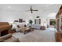 Bright living room with plush seating, a ceiling fan, and an open layout perfect for entertaining at 2736 Leisure World --, Mesa, AZ 85206