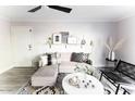 Cozy living room featuring modern furnishings, decorative pillows, and a chic area rug at 3500 N Hayden Rd # 2103, Scottsdale, AZ 85251