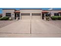 Beautiful exterior featuring well maintained front yard and attached garage with concrete driveway at 4502 E Carol Ave # 1, Mesa, AZ 85206