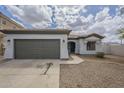 Charming single-Gathering home with desert landscaping, two car garage, and tile roof at 507 W Magdalena Ln, Phoenix, AZ 85041
