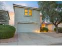Charming two-story home with a two-car garage and manicured landscaping at 5110 E Peak View Rd, Cave Creek, AZ 85331