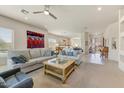 Spacious living room featuring plush sofas, open layout, and lots of natural light at 15201 N Zapata Dr, Fountain Hills, AZ 85268