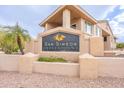 Community signage for San Simeon Condominiums, set amongst desert landscaping at 16013 S Desert Foothills Pkwy # 2055, Phoenix, AZ 85048