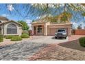 Beautiful two-story home with a well-manicured front yard and ample parking at 18601 N 16Th Pl, Phoenix, AZ 85024
