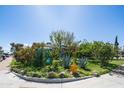 Corner lot with lush greenery, trees, and a yellow fire hydrant at 18829 N 23Rd Ave, Phoenix, AZ 85027