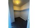 This spacious closet offers ample storage with shelving and a roll of carpet at 2666 N 43Rd Ave # C, Phoenix, AZ 85009