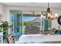 Bright dining room with view of outdoor living area at 33275 N 132Nd Ave, Peoria, AZ 85383