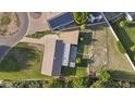Aerial view of the property showcasing the roof, driveway, and surrounding landscape at 4813 N 28Th Pl, Phoenix, AZ 85016