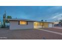 Attractive single-story home with a well-manicured front yard and convenient attached garage at 5401 E Cicero St, Mesa, AZ 85205