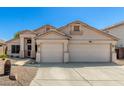 Attractive single-Gathering home featuring a spacious two-car garage and drought-tolerant front yard at 6539 W Briles Rd, Phoenix, AZ 85083