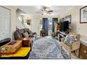 Open living room featuring neutral tones, area rug, and bright natural light at 625 S Westwood -- # 121, Mesa, AZ 85210