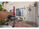 Cozy patio area with seating, table, grill, and outdoor decor at 625 S Westwood -- # 121, Mesa, AZ 85210