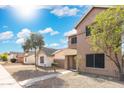 Attractive two-story home boasting a well-kept front yard and quaint landscaping, offering a welcoming curb appeal at 6811 W Aire Libre Ave, Peoria, AZ 85382