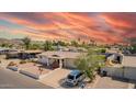 Inviting single-story home with well-kept landscaping, a covered porch, and a convenient driveway for parking at 809 N 95Th St, Mesa, AZ 85207