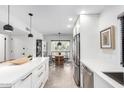 Well-lit kitchen with stainless steel appliances and an adjacent dining area at 8754 E Via De Sereno --, Scottsdale, AZ 85258